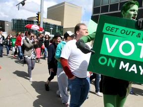 Keegan Callahan (right) takes part in a "Vote Mob" march as Edmonton youth walk south down 112 Street from the University of Alberta, Saturday April 30, 2011.
DAVID BLOOM/EDMONTON SUN  QMI AGENCY