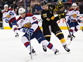 Edmonton's Jake Kohlhauser is pursued by Brandon's Colton Waltz during the second period of Sunday's game at Rexall Place. (Codie McLachlan, Edmonton Sun)