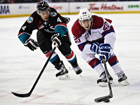 Mads Eller, shown here in action against Kelowna earlier this season, had the crowd concerned Sunday when he took a few minutes to get to his feet after crashing into the boards. (Codie MacLachlan, Edmonton Sun)