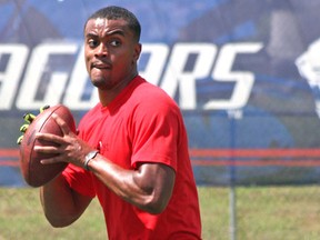 Mississauga native Brandon Bridge warms up Monday prior to throwing passes for NFL scouts at the University of Alabama pro day in Mobile, Ala. Bridge is seen as a likely late-round pick in the NFL draft, April 30 to May 2. ( John Kryk, QMI Agency)