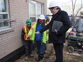Mayor John Tory visits a TCHC construction project in Toronto on Monday March 30, 2015. (Craig Robertson/Toronto Sun)