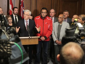 Two staunch allies of Premier Greg Selinger have drafted a "pledge of solidarity" for all NDP MLAs to sign. (Chris Procaylo/Winnipeg Sun file photo)