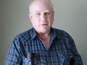 Sarnia Rock and Fossil Club president Ivan McKay holds open a split Thunder Egg from the west coast.
CARL HNATYSHYN/SARNIA THIS WEEK/QMI AGENCY