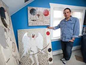Artist Wayne Ashley is seen with his artwork at his home in Edmonton, Alta., on Monday, March 30, 2015. Ashley has made several art pieces referencing recent murders and missing and murdered Aboriginal women. Ian Kucerak/Edmonton Sun/ QMI Agency