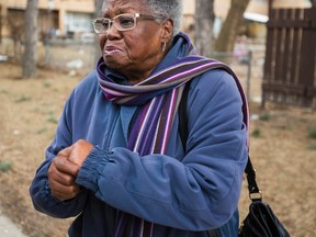 Donald Beckles's mother speaks to the media near the spot where her son was shot dead on Jamestown Cr. in Toronto Tuesday March 31, 2015. (Ernest Doroszuk/Toronto Sun)