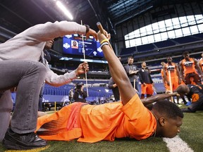 Quarterback Jameis Winston of Florida State gets measured during the 2015 NFL Scouting Combine at Lucas Oil Stadium on February 21, 2015. (Joe Robbins/Getty Images/AFP