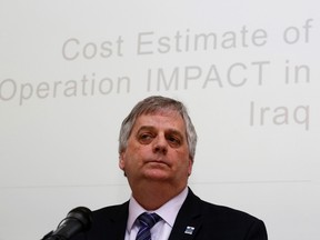Canada's Parliamentary Budget Officer Jean-Denis Frechette takes part in a news conference upon the release of his report in Ottawa on Feb. 17. (REUTERS/Chris Wattie)