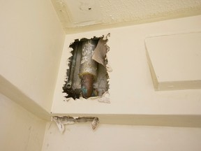 Pictured is a wall at the Grassways housing complex in the Jane St.-Finch Ave. area. (ERNEST DOROSZUK, Toronto Sun)