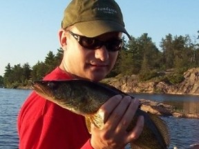 Local angler Bob Lamothe shows a nice walleye taken from local waters. The United Walleye Clubs is hosting its annual walleye workshop April 11 at the Howard Johnson Plaza.