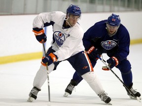 Joey LaLeggia, seen here in white during an Oilers development camp in 2012, will be joining the OKC Barons for their post-season run. (Perry Mah, Edmonton Sun)