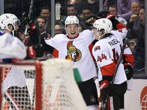 Ottawa Senators center Curtis Lazar (27) celebrates his goal right wing Erik Condra (22) and center Jean-Gabriel Pageau (44) in the second period against the Toronto Maple Leafs at Air Canada Centre on Mar 28, 2015 in Toronto, Ontario, CAN, (Tom Szczerbowski-USA TODAY Sports)