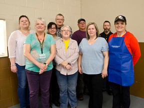 Volunteers from the Community Kitchen Social pose at Scout's Hall on Thursday Mar. 26th