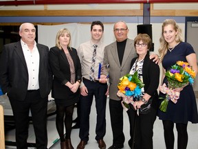 David Butler,Lise Payeur, Bobby Vezeau, Amy Vezau, Dan Vezeau, and Rose Vezeau of CGV Buidlers pose at the Board of Trade's 106th AGM held at the Tim Horton Event Centre. CGV Bulders had just been awarded as the Board of Trades Honoree. Missing from the photo is Michel and Francine Vezeau.