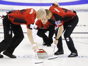 Canadian skip Pat Simmons delivers a rock against Switzerland during the 12th draw of the world championship in Halifax April 1, 2015. (REUTERS/Mark Blinch)