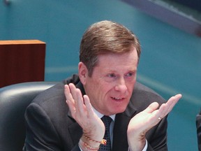 Mayor John Tory inside the council chamber of City Hall on Wednesday, April 1, 2015. (Veronica Henri/Toronto Sun)