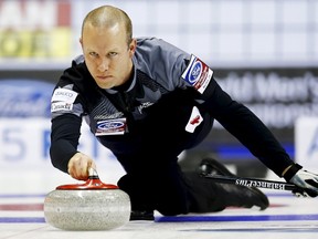 Canada's skip Pat Simmons delivers a rock against Norway during the 11th draw of the World Men's Curling Championships in Halifax, Nova Scotia, March 31, 2015.    REUTERS/Mark Blinch