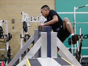 Ross Sheppard high school grade 12 student Anthony Mital, 17, participates in a physical fitness examination during the Edmonton Police Service (EPS) Youth Recruit Academy at the EPS Griesbach Training Facility, 14310 – 109 St., on Wednesday, April1 2015 in Edmonton, AB.  TREVOR ROBB/EDMONTON SUN