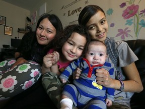 Liz Siebrecht and her children Allexis, 11, Jersey, 6, and infant boy Jasper. (Kevin King/Winnipeg Sun file)