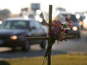 A memorial is seen at the intersection of St. Mary's Road and Bishop Grandin Boulevard in Winnipeg Monday, November 1, 2010 near where Amutha Subramanian and Senhit Mehari were killed by a 17-year-old female driver allegedly under the influence of alcohol.