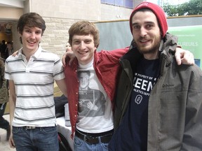 Queen's University exchange students Bastien Escaich, left, Sylvain Breux and Valentin Machado came up with a computer game about squirrels for a display by the university's school of computing. (Michael Lea/The Whig-Standard)