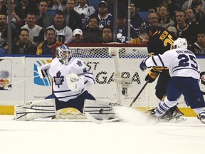 Leafs goalie Jonathan Bernier makes a save on Sabres’ Matt Moulson on Wednesday night in Buffalo. (USA TODAY SPORTS)
