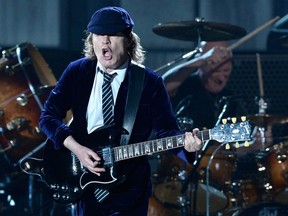 Guitarist Angus Young of AC/DC performs onstage during The 57th Annual GRAMMY Awards at the at the STAPLES Center on Feb. 8, 2015 in Los Angeles, California.