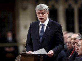 Canada's Prime Minister Stephen Harper outlines his government's plans to expand its military mission against Islamic State by launching air strikes against its positions in Syria as well as Iraq, in the House of Commons on Parliament Hill in Ottawa March 24, 2015. REUTERS/Chris Wattie