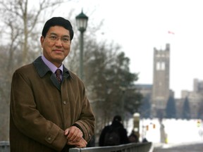 Amit Chakma poses at Western University when his appointment as president is announced in 2009. (London Free press file photo)