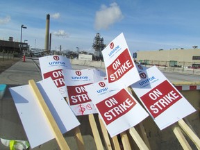 A two-week strike by unionized workers of SGS Canada, a company providing loading and unloading services to Imperial Oil in Sarnia, continues. But on Thursday, Imperial Oil was granted an injunction in Sarnia Superior Court limiting the picketing at the Imperial site. The injunction limits picketers delay of trucks at Imperial to 15 seconds. Photographed at Sarnia, Ontario on Monday, March 30, 2015.
PAUL MORDEN/ SARNIA OBSERVER/ QMI AGENCY