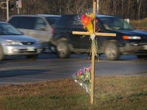 A memorial is seen at the intersection of St. Mary's Road and Bishop Grandin Boulevard in Winnipeg Monday, November 1, 2010 near where Amutha Subramanian and Senhit Mehari were killed by a 17-year-old female driver allegedly under the influence of alcohol.