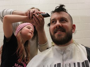 After raising more than $13,500 for cancer research, students at Parkland Village School were excited to shave principal Travis McNaughton’s head on March 26. The fundraising event, which included a one-kilometre walk around Parkland Village, was spearheaded by Grade 4 student Kayla Gerhardt as a way to honour her mother and Grade 1 teacher at the school, Desiree Gerhardt, who was recently diagnosed with cervical cancer. Karen Haynes, Reporter/Examiner