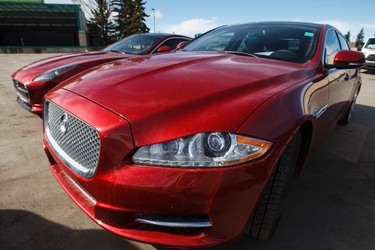 Jaguar cars are seen outside during setup for the 2015 Edmonton Motorshow at Edmonton Expo Centre in Edmonton, Alta., on Thursday, April 2, 2015. The show runs from April 9 to 12, 2015. The Precious Metal Gala is on April 8 at 6:30 p.m. Ian Kucerak/Edmonton Sun/ QMI Agency