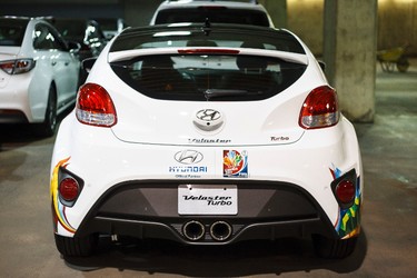 A Hyundai Veloster is seen after washing during setup for the 2015 Edmonton Motorshow at Edmonton Expo Centre in Edmonton, Alta., on Thursday, April 2, 2015. The show runs from April 9 to 12, 2015. The Precious Metal Gala is on April 8 at 6:30 p.m. Ian Kucerak/Edmonton Sun/ QMI Agency