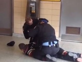 Two TTC transit enforcement officers make an arrest at Keele Station Nov. 15, 2014. The officers are believed to be the same ones involved in a violent take-down of a father and son in January 2015. (YouTube framegrab)