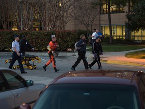 A Coast Guard helicopter crew lands at Sentara Norfolk General Hospital in Norfolk, Va., Thursday, April 2, 2015, after recusing a sailor who had been missing for more than 60 days. 
(U.S. Coast Guard photo by Petty Officer 2nd Class Walter Shinn)
