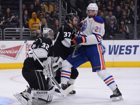 Luke Gazdic crashes the Kings net as Jonathan Quick makes a first-period save Thursday in Los Angeles.(USA TODAY SPORTS)