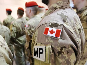 Canadian military personnel during a military police deployment at 8 Wing/CFB Trenton, Ont. Friday, March 6, 2015. JEROME LESSARD/QMI AGENCY