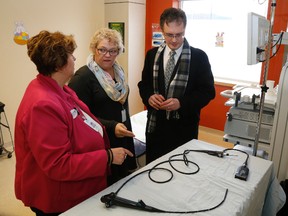 Jason Miller/The Intelligencer
From left: Wendy Werner, executive director, Trenton Memorial Hospital Foundation, Karen Baker and Brad Harrington QHC's chief financial officer, examine the newly-equipped cystoscopy clinic at Trenton.