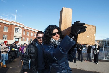 during the 35th annual Outdoor Way of the Cross in Edmonton, Alta., on Friday, April 3, 2015. Organizers said 900 people participated in eight stations of the Cross, on Good Friday. Ian Kucerak/Edmonton Sun/ QMI Agency