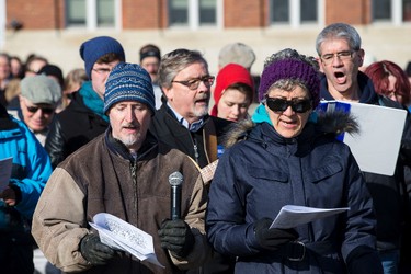 Patricipants sing during the 35th annual Outdoor Way of the Cross in Edmonton, Alta., on Friday, April 3, 2015. Organizers said 900 people participated in eight stations of the Cross, on Good Friday. Ian Kucerak/Edmonton Sun/ QMI Agency