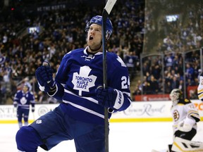 Forward Peter Holland, shown celebrating a goal against the Bruins earlier this season, could return to the Maple Leafs lineup tonight in Boston. (CRAIG ROBERTSON/TORONTO SUN)