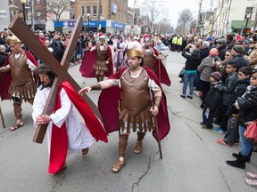 St. Francis of Assisi Catholic Church holds its  annual Good Friday Stations of the Cross procession down College St. in Little Italy on Friday April 3, 2015. Craig Robertson/Toronto Sun/QMI Agency