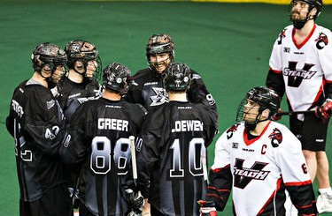 Edmonton Rush players celebrate a goal during the Edmonton Rush's NLL lacrosse game against the Vancouver Stealth at Rexall Place in Edmonton, Alta., on Friday, April 3, 2015. Codie McLachlan/Edmonton Sun/QMI Agency