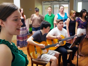 Two dozen members of the AVSS Off Broadway Singers including Rachel Sherret, left, entertain residents at Goodness Retirement Living in 2013 in St. Thomas. The show choir under direction of teacher Tom Pietrangelo was performing as part of the national Music Monday 2013 celebration of school music.