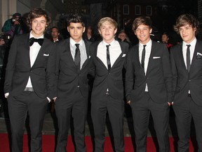 One Direction’s Harry Styles, Zayn Malik, Niall Horan, Louis Tomlinson and Liam Payne attend the GQ Men of the Year Awards in London in this file photo. (WENN.COM)