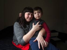Monique Guillamot and her son Keyaan Kortli, 4, pose for a photo in their home, in Edmonton Alta., on Thursday March 18, 2015. Keyaan has Dravet Syndrome, a condition that his mother says is alleviated through the use of medical marijuana. David Bloom/Edmonton Sun/QMI Agency