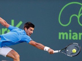Novak Djokovic will face rival Andy Murray Sunday after defeating John Isner in a men's singles semi-final on day twelve of the Miami Open. (Geoff Burke/USA TODAY Sports)