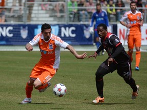 Fury's Mike Randolph pursues the ball against a Railhawks player in Carolina April 4, 2015. (Carolina railhawks)