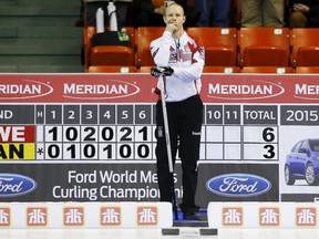 Canada's skip Pat Simmons waits between ends as his team plays Sweden during their semi-final match at the World Men's Curling Championships in Halifax, Nova Scotia, April 4, 2015. (REUTERS/Mark Blinch)