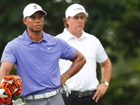 Tiger Woods and Phil Mickelson. (Reuters)